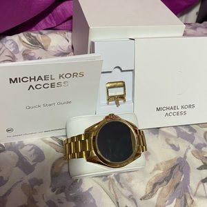 MK gold watch